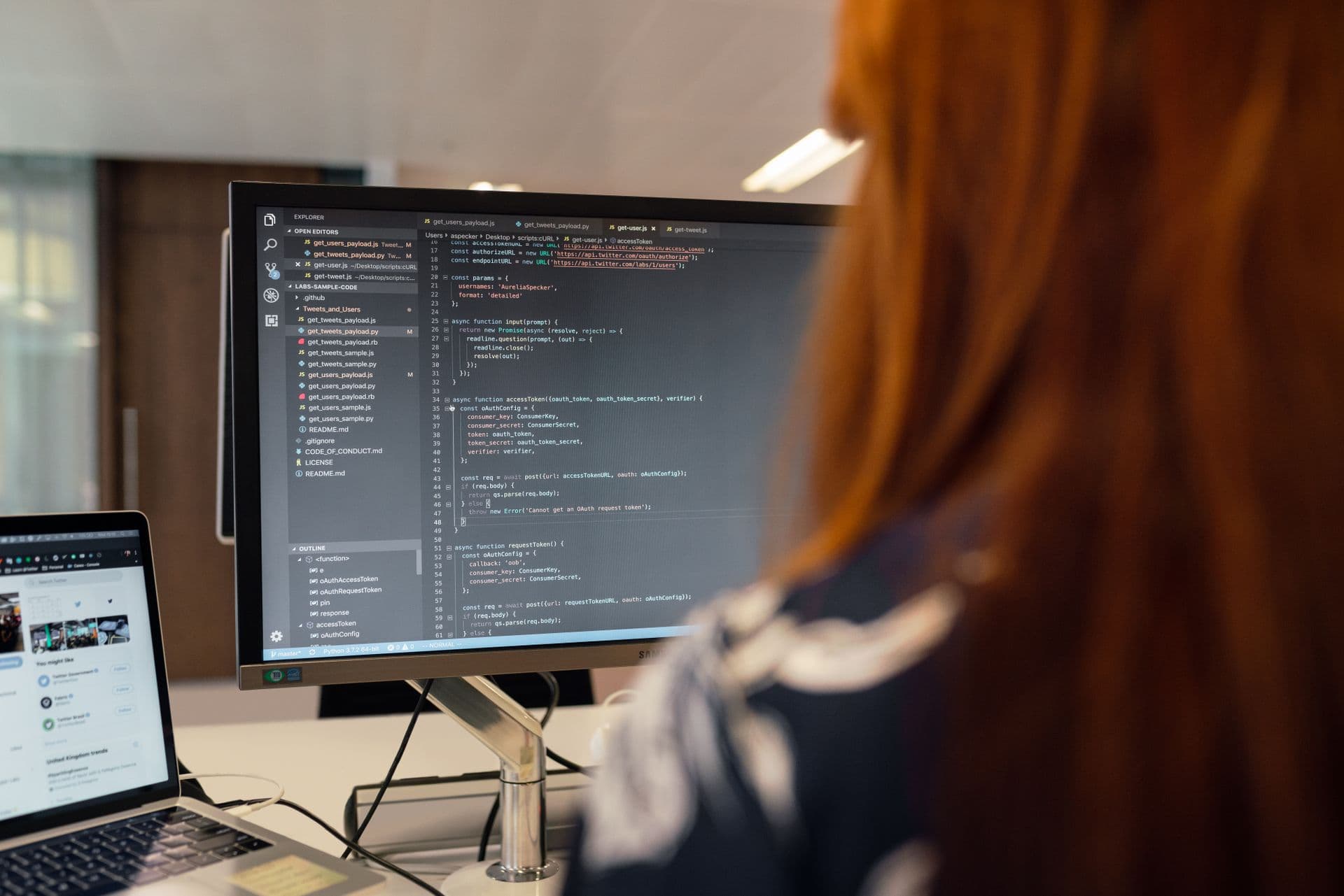 Engineer writing code for a client platform