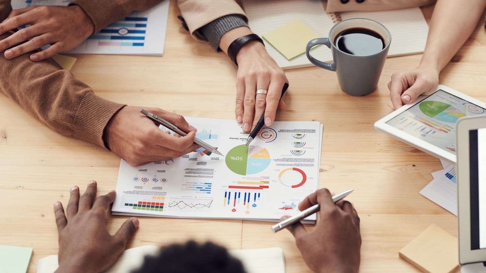 Marketing team reviewing campaign performance analytics