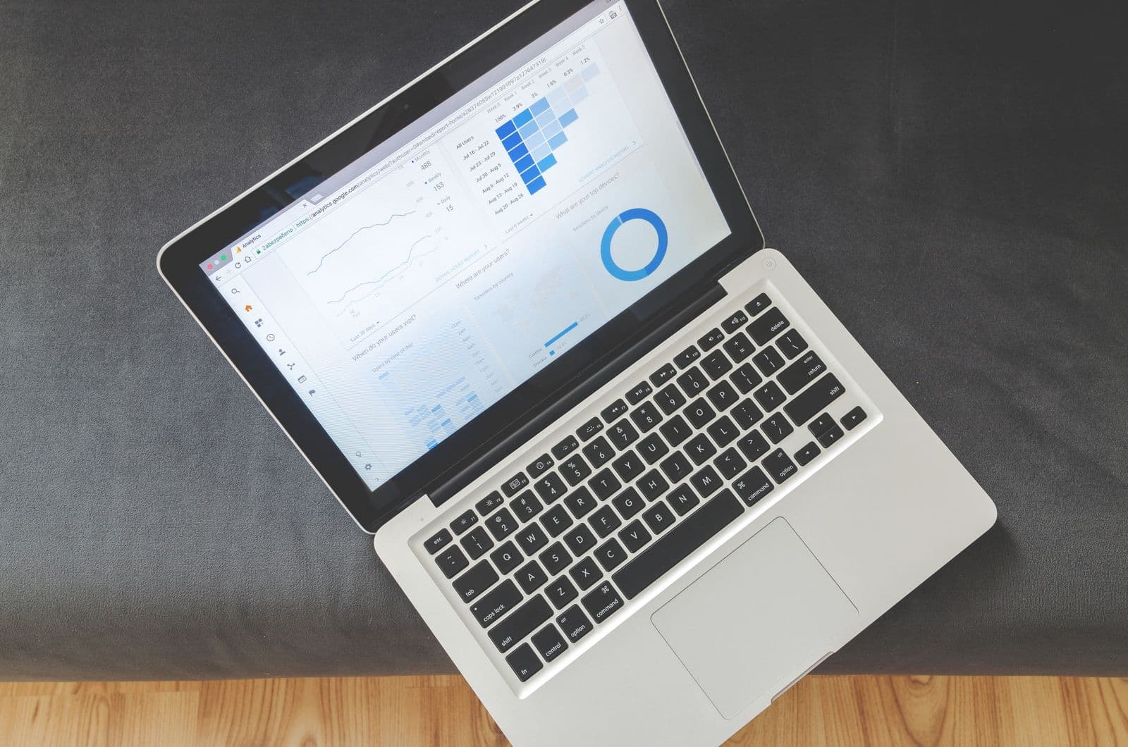 Developer building a custom web application on a large monitor